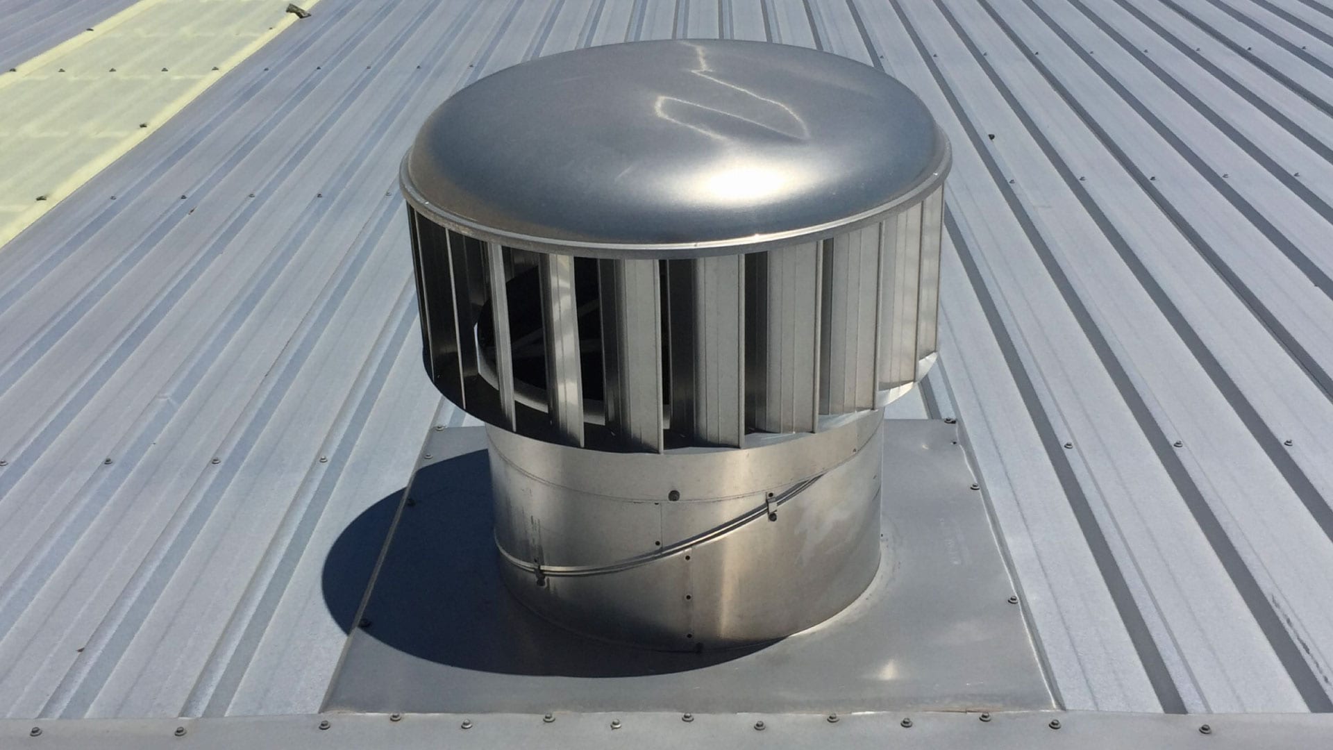 commercialroofventilatoronmetalindustrialroofsydney Roof Ventilation Whirlybirds Australia