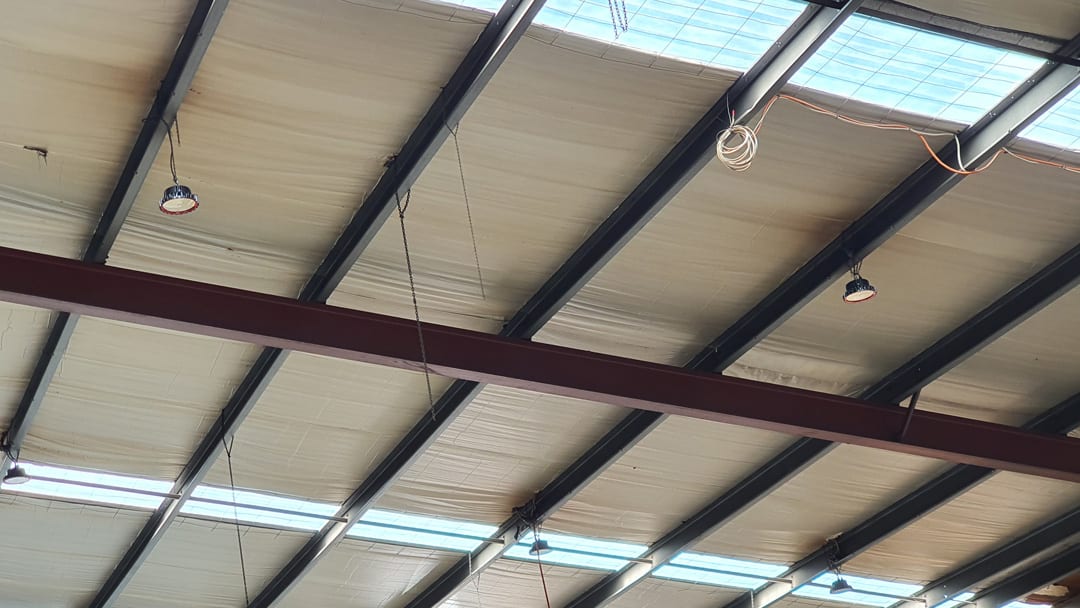 New Skylight Roof Panels Allowing Greater Light into Warehouse
